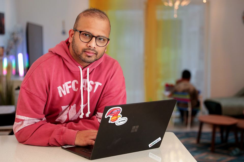 Tech worker Debanjan Dutta jokes he has 'been through it all' when it comes to working from home with his seven-year-old son. Photo: Gerry Mooney